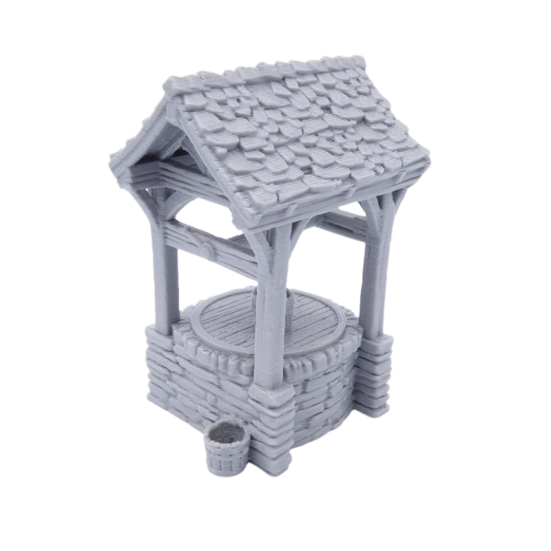 Gray stone well on a white background