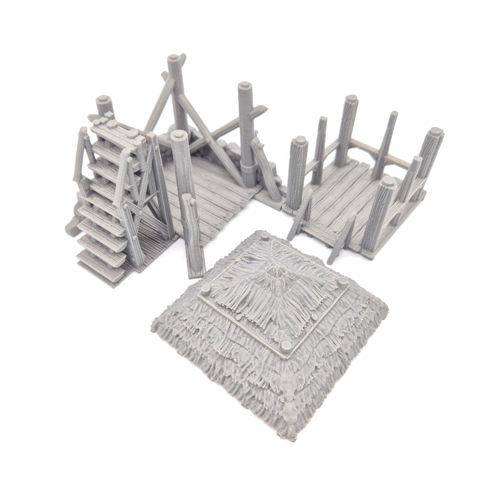 Gray plastic clips and a textured gray square on a white background