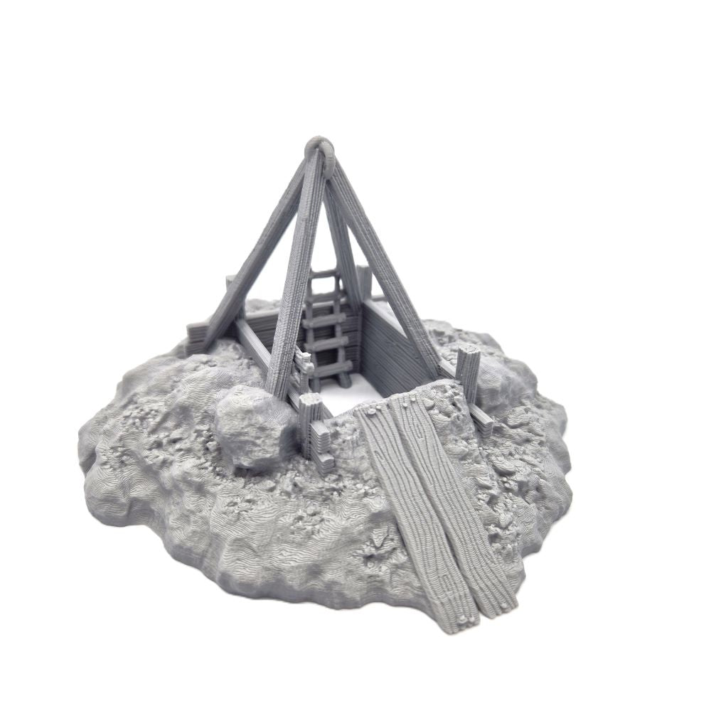 Model of a Mine on a rocky base with a white background