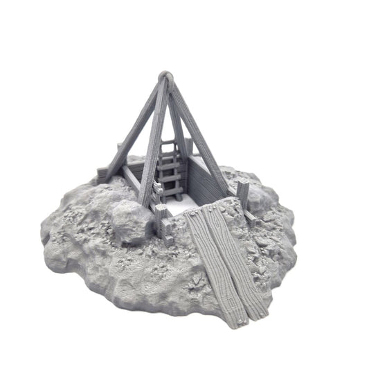Model of a Mine on a rocky base with a white background