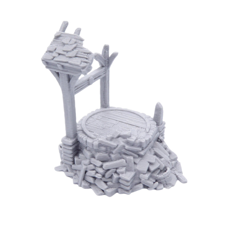 3D-printed miniature well with bucket on a white background