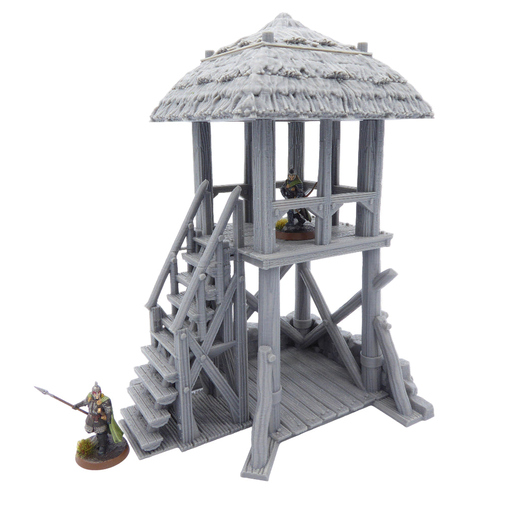 Model of a wooden watchtower with stairs and a thatched roof on a white background